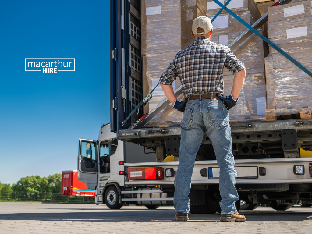 Hire truck loaded with furniture, boxes and equipment secured for transport, representing safe truck loading in the Macarthur region.