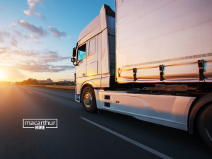2 Ton Tray Truck carrying secured equipment
